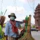 ကမ္ဘောဒီးယား နိုင်ငံ ဖနွမ်းပင်မြို့၌ နှာခေါင်းစည်း တပ်ဆင်၍ ဈေးရောင်းနေသူ တစ်ဦးအား မတ်လ အတွင်းက တွေ့ရစဉ်(ဆင်ဟွာ)