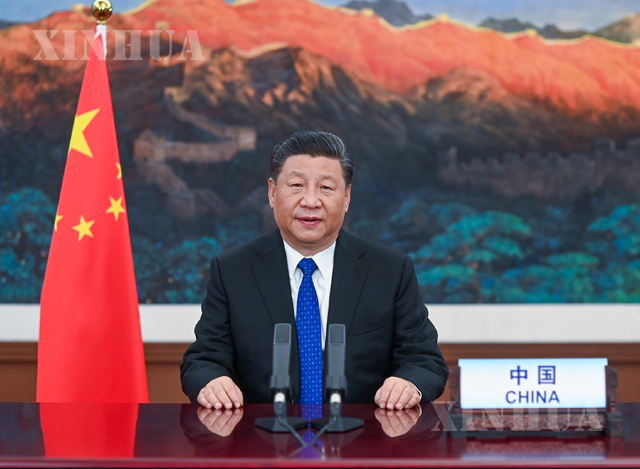 တရုတ်နိုင်ငံ သမ္မတ ရှီကျင့်ဖိန် (၇၃)ကြိမ်မြောက် ကမ္ဘာ့ကျန်းမာရေးညီလာခံ ဗွီဒီယိုကွန်ဖရင့်တွင် အဖွင့်မိန့်ခွန်းစကား ပြောကြားနေသည်ကို တွေ့ရစဉ်(ဆင်ဟွာ)