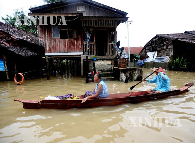 ၂၀၁၈ ခုနှစ် တွင် ကရင်ပြည်နယ် ဘားအံမြို့တွင် ရေကြီးမှု တစ်ခုအားတွေ့ရစဉ် (ဆင်ဟွာ)