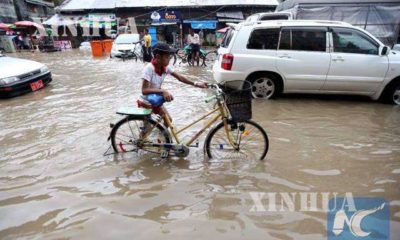 ၂၀၁၈ ခုနှစ်တွင် ရန်ကုန်မြို့၌ မိုးရွာသွန်းပြီးနောက် ရေကြီးမှုတစ်ခုအားတွေ့ရစဉ် (ဆင်ဟွာ)