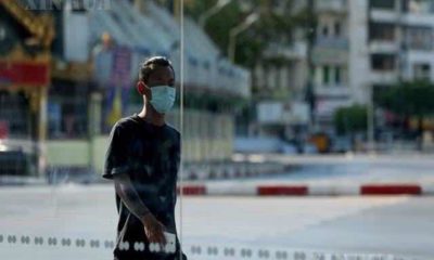 ရန်ကုန်မြို့ရှိပြည်သူများ COVID-19 ကြိုတင်ကာကွယ်ရေး နှာခေါင်းစီးများအဖြစ်ဆင် သွားလာနေမှုအားတွေ့ရစဉ်(ဆင်ဟွာ)