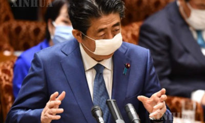 ဂျပန်နိုင်ငံ ဝန်ကြီးချုပ်ရှင်ဇိုအာဘေးအား ဧပြီ ၃၀ ရက်က တိုကျိုမြို့ အထက်လွှတ်တော် ဘတ်ဂျက်ကော်မတီ အစည်းအဝေးတွင် တွေ့ရစဉ်(ဆင်ဟွာ)