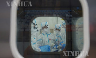 ပေကျင်းမြို့ Daxing ခရိုင်ရှိ လေအိတ်သုံး COVID-19 ဓာတ်ခွဲခန်း နှင့် ဓာတ်ခွဲခန်းအတွင်း လုပ်ကိုင်နေကြသော ဝန်ထမ်းများအား တွေ့ရစဉ်(ဆင်ဟွာ)