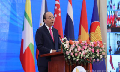 ဗီယက်နမ် နိုင်ငံ ဝန်ကြီးချုပ် Nguyen Xuan Phuc က အာဆီယံ ထိပ်သီးအစည်းအဝေး ဖွင့်ပွဲ ၌ မိန့်ခွန်းပြောကြားနေစဉ်(ဆင်ဟွာ)