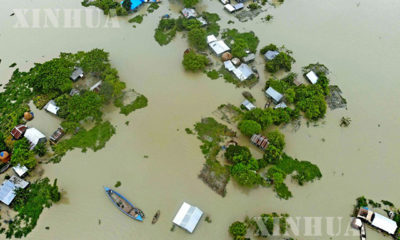 ဘင်္ဂလားဒေ့ရှ်နိုင်ငံ ဖာရစ်ပါရ်ခရိုင်တွင် ရေကြီးရေလျှံမှုကြောင့် နေအိမ်များ နစ်မြုပ်နေသည်ကို တွေ့ရစဉ် (ဆင်ဟွာ)