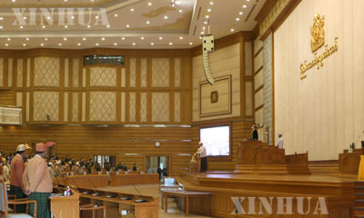 ပြည်ထောင်စု လွှတ်တော် အစည်းအဝေးခန်းမအတွင်းသို့ လွှတ်တော် နာယက ရောက်ရှိစဉ်(ဆင်ဟွာ)