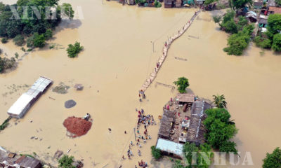 အိန္ဒိယနိုင်ငံ ဘီဟာပြည်နယ်၌ ရေကြီးမှုဖြစ်ပွားနေသည်ကို ဇူလိုင် ၂၆ ရက်ကတွေ့ရစဉ်(ဆင်ဟွာ)