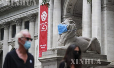 အမေရိကန်နိုင်ငံ နယူးယောက်မြို့၌ နှာခေါင်းစည်း တပ်ဆင်သွားလာသူများအား ဇူလိုင် ၈ ရက်က တွေ့ရစဉ်(ဆင်ဟွာ)