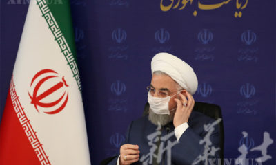 အီရန်နိုင်ငံ သမ္မတ ရိုဟာနီအား ဇူလိုင် ၁၈ ရက်က တီဟီရန်မြို့တွင် ကျင်းပသော ကပ်ရောဂါတိုက်ဖျက်ရေးအစည်းအဝေးတွင် တွေ့ရစဉ်(ဆင်ဟွာ)