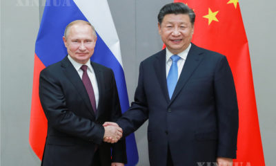 တရုတ်နိုင်ငံ သမ္မတ ရှီကျင့်ဖိန်နှင့် ရုရှားနိုင်ငံ သမ္မတ ဗလာဒီမာပူတင်တို့အား တွေ့ရစဉ် (ဆင်ဟွာ)