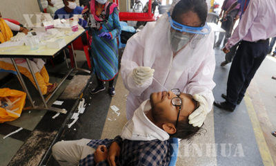 အိန္ဒိယနိုင်ငံတွင် COVID-19ရောဂါ စစ်ဆေးမှုများ ပြုလုပ်နေသည်ကို ဇူလိုင် ၁၄ ရက်က တွေ့ရစဉ်(ဆင်ဟွာ)