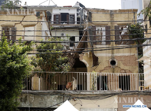 လက်ဘနွန်နိုင်ငံ ဘေရွတ်မြို့တွင် ပေါက်ကွဲမှုကြောင့် ပျက်စီးသွားသည့် အဆောက်အအုံတစ်ခုအား တွေ့ရစဉ် (ဆင်ဟွာ)