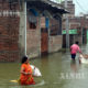 အိန္ဒိယနိုင်ငံတွင် ရေကြီးမှု ဖြစ်ပွားနေသည့်မြင်ကွင်းများကို တွေ့ရစဉ်(ဆင်ဟွာ)