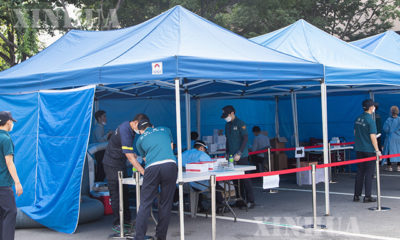 တောင်ကိုရီးယားနိုင်ငံ ဆိုးလ်မြို့တွင် COVID-19ရောဂါ စစ်ဆေးမှုများ ပြုလုပ်နေသည်ကို ဩဂုတ် ၁၉ ရက်က တွေ့ရစဉ်(ဆင်ဟွာ)