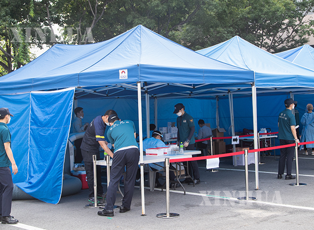 တောင်ကိုရီးယားနိုင်ငံ ဆိုးလ်မြို့တွင် COVID-19ရောဂါ စစ်ဆေးမှုများ ပြုလုပ်နေသည်ကို ဩဂုတ် ၁၉ ရက်က တွေ့ရစဉ်(ဆင်ဟွာ)