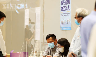 တရုတ်နိုင်ငံ ဟောင်ကောင် အထူးအုပ်ချုပ်ခွင့်ရဒေသတွင် ကိုရိုနာဗိုင်းရပ်စ်ဓတ်ခွဲစစ်ဆေးမှုအဖြေအား စိစစ်နေသည်ကို စက်တင်ဘာ ၁ ရက်က တွေ့ရစဉ်(ဆင်ဟွာ)