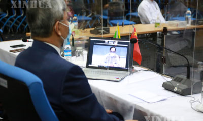  မြန်မာနိုင်ငံဆိုင်ရာတရုတ်နိုင်ငံသံအမတ်ကြီး မစ္စတာချန်းဟိုင်နှင့် Video Conferencing စနစ်ဖြင့်အခမ်းအနားတက်ရောက်နေသည့် ကျန်းမာရေးနှင့်အားကစားဝန်ကြီးဌာန ပြည်ထောင်စုဝန်ကြီး ဒေါက်တာမြင့်ထွေးအားတွေ့ရစဉ်  (ဆင်ဟွာ) 
