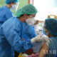 ရန်ကုန်ဆေးရုံကြီး ၌ ကျန်းမာရေးဝန်ထမ်းများအား COVID-19 ကာကွယ်ဆေး ထိုးနှံပေး နေစဉ်(ဆင်ဟွာ)