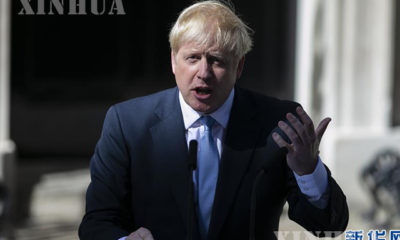 ဗြိတိန်နိုင်ငံဝန်ကြီးချုပ် Boris Johnson မိန့်ခွန်းပြောကြားနေသည်ကိုမြင်တွေ့ရစဉ်(ဆင်ဟွာ)