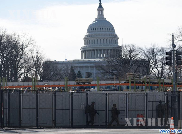 အမေရိကန်နိုင်ငံ Capitol လွှတ်တော်အဆောက်အဦ မလှမ်းမကမ်းတွင် ပစ်ခတ်မှုဖြစ်ပွားပြီးနောက် လွှတ်တော်အား လုံခြုံရေးတပ်ဖွဲ့များချ၍ lockdown ပြုလုပ်ထားသည်ကို ၂၀၂၁ ခုနှစ် ဇန်နဝါရီ ၁၈ ရက်က တွေ့ရစဉ်(ဆင်ဟွာ)