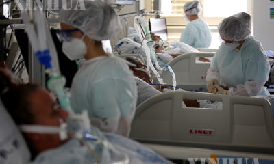 ပေါ်တူဂီနိုင်ငံ လစ္စဘွန်းရှိ ဆေးရုံတစ်ရုံတွင် ဆေးဘက်ဆိုင်ရာဝန်ထမ်းများက COVID-19 ရောဂါ ဝေဒနာရှင်များအား ကုသပေးနေစဉ်(ဆင်ဟွာ)
