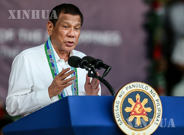 ဖိလစ်ပိုင်နိုင်ငံ Quezon မြို့တွင် ၂၀၁၉ ခုနှစ် ဒီဇင်ဘာ ၁၇ ရက်တွင် ပြုလုပ်သည့် ၈၄ နှစ်မြောက် ဖိလစ်ပိုင်လက်နက်ကိုင်တပ်ဖွဲ့နေ့(AFP) အခမ်းအနားတွင် မိန့်ခွန်းပြောကြားနေသော ဖိလစ်ပိုင် သမ္မတဒူတာတေးအား တွေ့ရစဉ်(ဆင်ဟွာ)