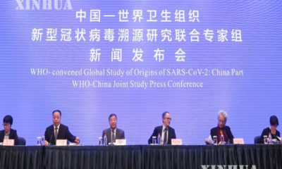 တရုတ်နိုင်ငံ အလယ်ပိုင်း ဟူပေပြည်နယ် ဝူဟန့်မြို့တွင် WHO-တရုတ် ပူးတွဲလေ့လာမှုဆိုင်ရာ သတင်းစာရှင်းလင်းပွဲ ပြုလုပ်နေသည်ကို တွေ့ရစဉ် (ဆင်ဟွာ)