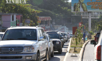 ဟေတီနိုင်ငံ၏ မြို့တော် Port-au-Prince တွင် မော်တော်ယာဥ်များ သွားလာနေသည်ကိုတွေ့ရစဉ် (ဆင်ဟွာ)